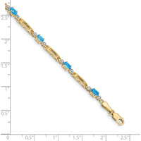 14K Yellow Gold 7" Bracelet with Oval Swiss Blue Topaz and Round Diamonds - 0.30 Carats Total Swiss Blue Topaz, 0.005 Carats Total Diamond Weight by Oro Pregiato