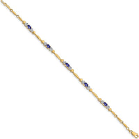 14K Yellow Gold 7" Bracelet with Oval Tanzanite and Round Diamond Accents - 0.38 Carats Total Tanzanite Weight by Oro Pregiato