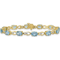 14K Yellow Gold 7" Fancy Link Bracelet with Oval Swiss Blue Topaz and Round Diamonds - 0.75 Carats Total Gemstone Weight by Monteluci Fine Jewelry