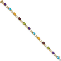 14K Yellow Gold 7" Rainbow Bracelet with Amethyst, Swiss Blue Topaz, Citrine, Garnet, Peridot, and Diamonds by Monteluci Fine Jewelry