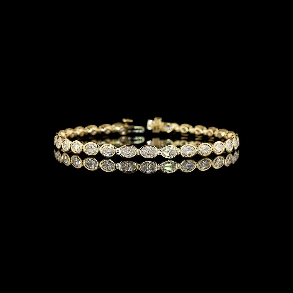 14K Yellow Gold 7" Tennis Bracelet with 30 East-West Bezel Set Oval Lab Diamonds - 6.34 Carats Total Diamond Weight - Covaloro Fine Jewelry