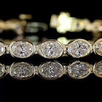 14K Yellow Gold 7" Tennis Bracelet with 30 East-West Bezel Set Oval Lab Diamonds - 6.34 Carats Total Diamond Weight - Covaloro Fine Jewelry
