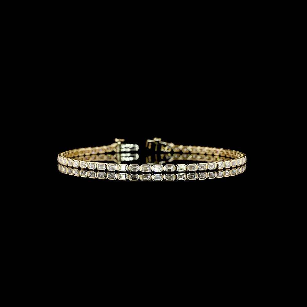 14K Yellow Gold 7" Tennis Bracelet with East-West Bezel Set Emerald Cut Lab Diamonds - 2.47 Carat Total Weight - Covaloro Fine Jewelry