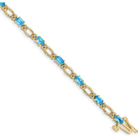 14K Yellow Gold 7" Tennis Bracelet with Oval Swiss Blue Topaz and Round Diamonds - 0.30 Carats Total Topaz Weight, 0.004 Carats Total Diamond Weight by Oro Pregiato