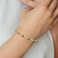 14K Yellow Gold 7" Tennis Bracelet with Round Sapphires and Diamonds - 1.68 Carats Total Gem Weight by Monteluci Fine Jewelry