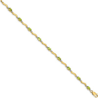 14K Yellow Gold 7" Wavy Link Bracelet with Oval Peridot and Round Diamonds - 0.25 Carats Total Peridot Weight by Monteluci Fine Jewelry