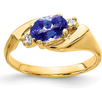 14K Yellow Gold 7x5mm Oval Tanzanite and Diamond Three-Stone Ring - 0.86 Carat Tanzanite, 0.028 Carat Diamond Total Weight by Monteluci Fine Jewelry