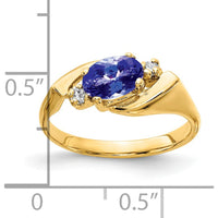 14K Yellow Gold 7x5mm Oval Tanzanite and Diamond Three-Stone Ring - 0.86 Carat Tanzanite, 0.028 Carat Diamond Total Weight by Monteluci Fine Jewelry