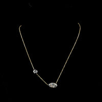 14K Yellow Gold Asymmetric Station Pendant with 2.80 Carats Marquise Cut Lab Diamond (F VVS2) with Black Rhodium Prongs and 0.74 Carats Brilliant Cut Lab Diamond Accent - Covaloro Fine Jewelry
