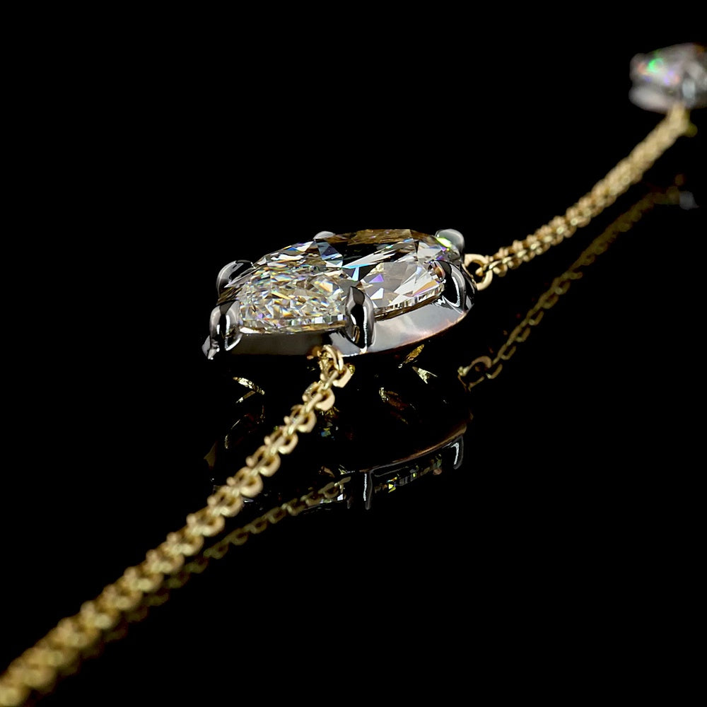 14K Yellow Gold Asymmetric Station Pendant with 2.80 Carats Marquise Cut Lab Diamond (F VVS2) with Black Rhodium Prongs and 0.74 Carats Brilliant Cut Lab Diamond Accent - Covaloro Fine Jewelry