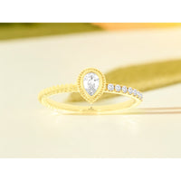 14K Yellow Gold Asymmetrical Pear-Shaped Diamond Ring with Milgrain Bezel and Bead-Set Accents - 0.30 Carat Total Diamond Weight - Royal Jewelry