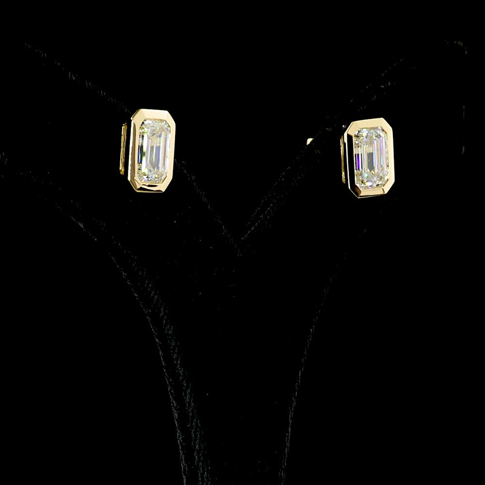 14K Yellow Gold Bezel Set Emerald Cut Lab Diamond Stud Earrings - 4.52 Carat Total Weight, D VS1 IGI Certified - Covaloro Fine Jewelry
