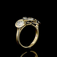 14K Yellow Gold Bezel Set Three Stone Oval Cut Lab Diamond Ring Featuring a 2.01 Carat Center Stone with E-F VVS2 Clarity - 4.07 Carats Total Diamond Weight - Covaloro Fine Jewelry