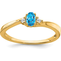14K Yellow Gold Blue Topaz and Diamond Ring with Oval Topaz and Round Diamond Accents - 0.02 Carat Diamond Total Weight by 0