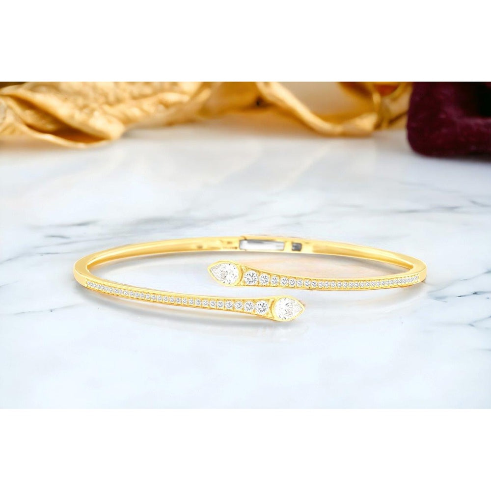 14K Yellow Gold Bypass Bangle with Micro-Pave Round Diamonds and Pear-Shaped Diamond Accents - 1.14 Carat Total Diamond Weight - Royal Jewelry