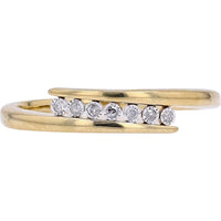 14K Yellow Gold Bypass Ring with 0.05 Carat Total Diamond Weight