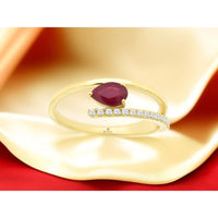 14K Yellow Gold Bypass Ring with Pear Shaped Ruby and Round Diamond Accents - 0.52 Carat Ruby, 0.11 Carat Total Diamond Weight - Royal Jewelry