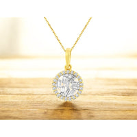 14K Yellow Gold Circular Halo Pendant with Geometric Baguette and Round Diamond Cluster - 0.21 Carat Total Diamond Weight - Royal Jewelry