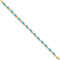 14K Yellow Gold Complete Diamond and Oval Swiss Blue Topaz Floral 7" Bracelet - 0.56 Carats Swiss Blue Topaz, 0.11 Carats Diamond Total Weight by Monteluci Fine Jewelry