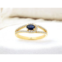 14K Yellow Gold Contemporary Split Shank Ring with Oval Sapphire and Pavé Set Round Diamonds - 0.28 Carat Sapphire and 0.20 Carat Total Diamond Weight - Royal Jewelry