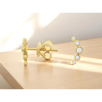 14K Yellow Gold Curved Diamond Ear Climbers with Graduated Bezel-Set Round Diamonds - 0.15 Carat Total Diamond Weight - Royal Jewelry