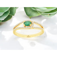 14K Yellow Gold Curved Halo Ring with Oval Emerald and Pavé Set Round Diamonds - 0.22 Carat Emerald and 0.20 Carat Total Diamond Weight - Royal Jewelry