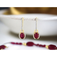 14K Yellow Gold Drop Earrings with Oval Rubies and Diamond Halos - 1.80 Carat Total Ruby Weight and 0.25 Carat Total Diamond Weight - Royal Jewelry