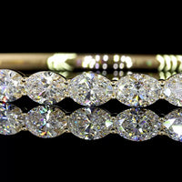 14K Yellow Gold East-West Bangle Bracelet with 13 Oval Cut Lab Diamonds - 5.64 Carats Total Diamond Weight - Covaloro Fine Jewelry