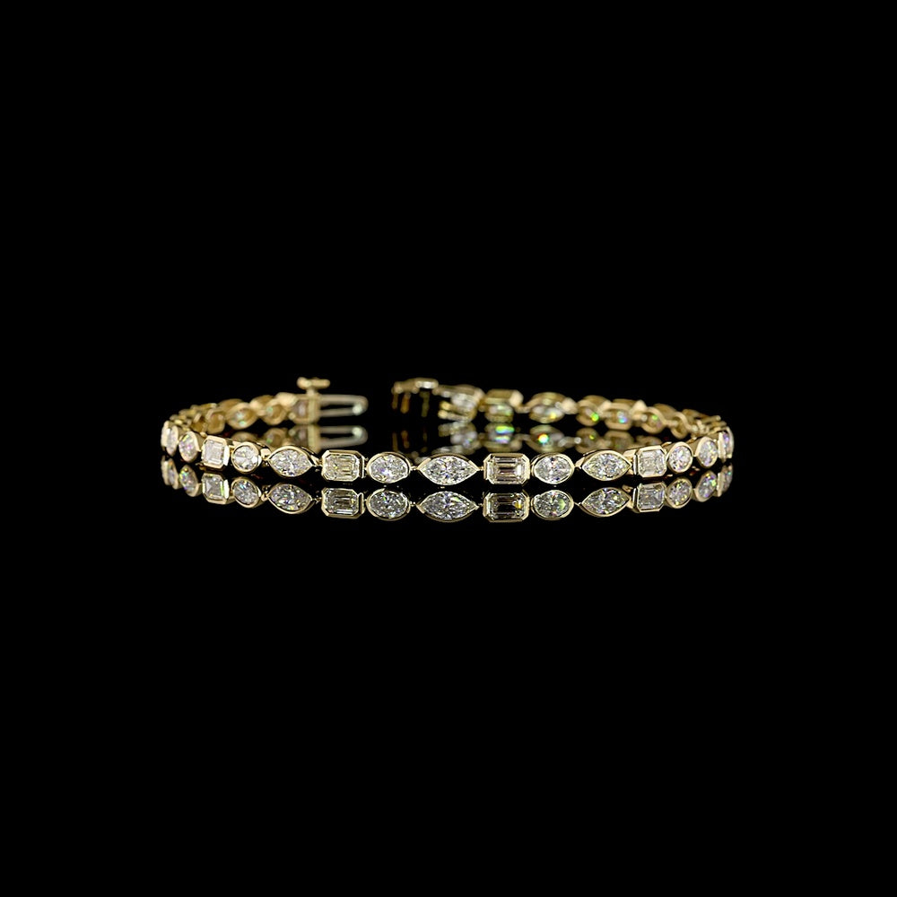 14K Yellow Gold East-West Bezel Set Mixed Shape Tennis Bracelet with 4.77 Carats Lab-Grown Emerald, Oval, and Marquise Diamonds - Covaloro Fine Jewelry