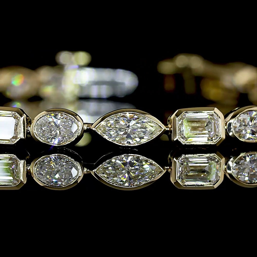 14K Yellow Gold East-West Bezel Set Mixed Shape Tennis Bracelet with 4.77 Carats Lab-Grown Emerald, Oval, and Marquise Diamonds - Covaloro Fine Jewelry