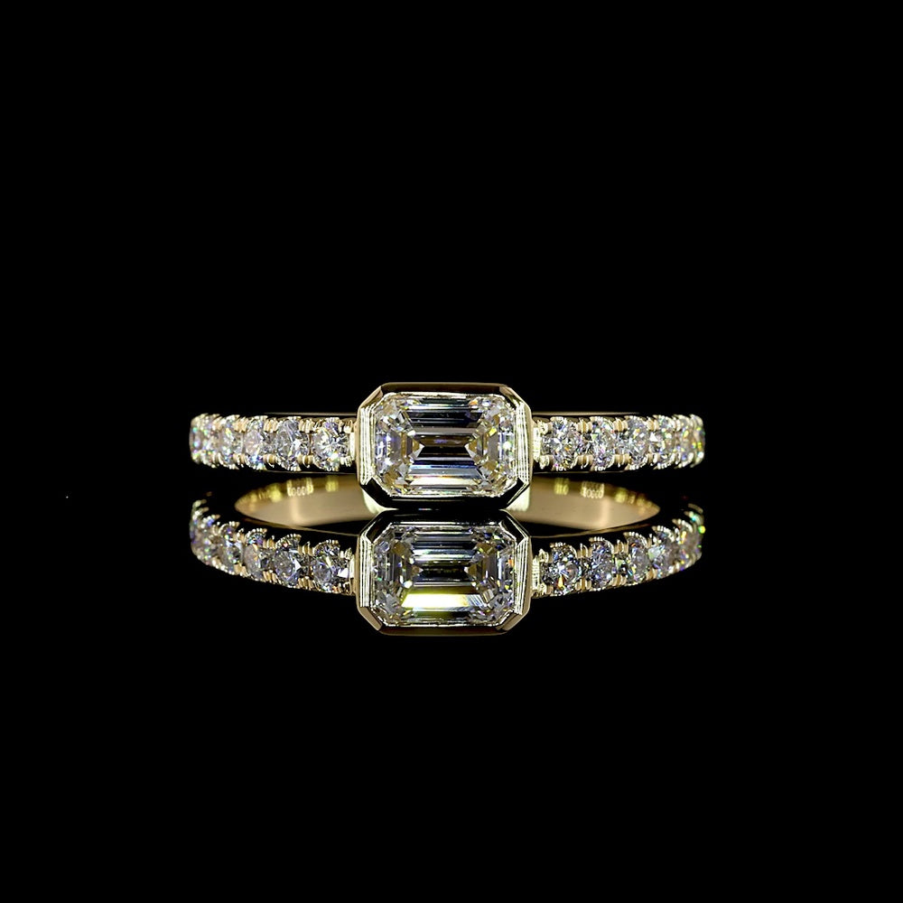 14K Yellow Gold East-West Emerald Cut Lab Diamond Ring with Bezel and Prong Set Accents - 0.76 Carat Total Weight - Covaloro Fine Jewelry