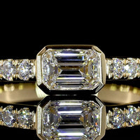 14K Yellow Gold East-West Emerald Cut Lab Diamond Ring with Bezel and Prong Set Accents - 0.76 Carat Total Weight - Covaloro Fine Jewelry