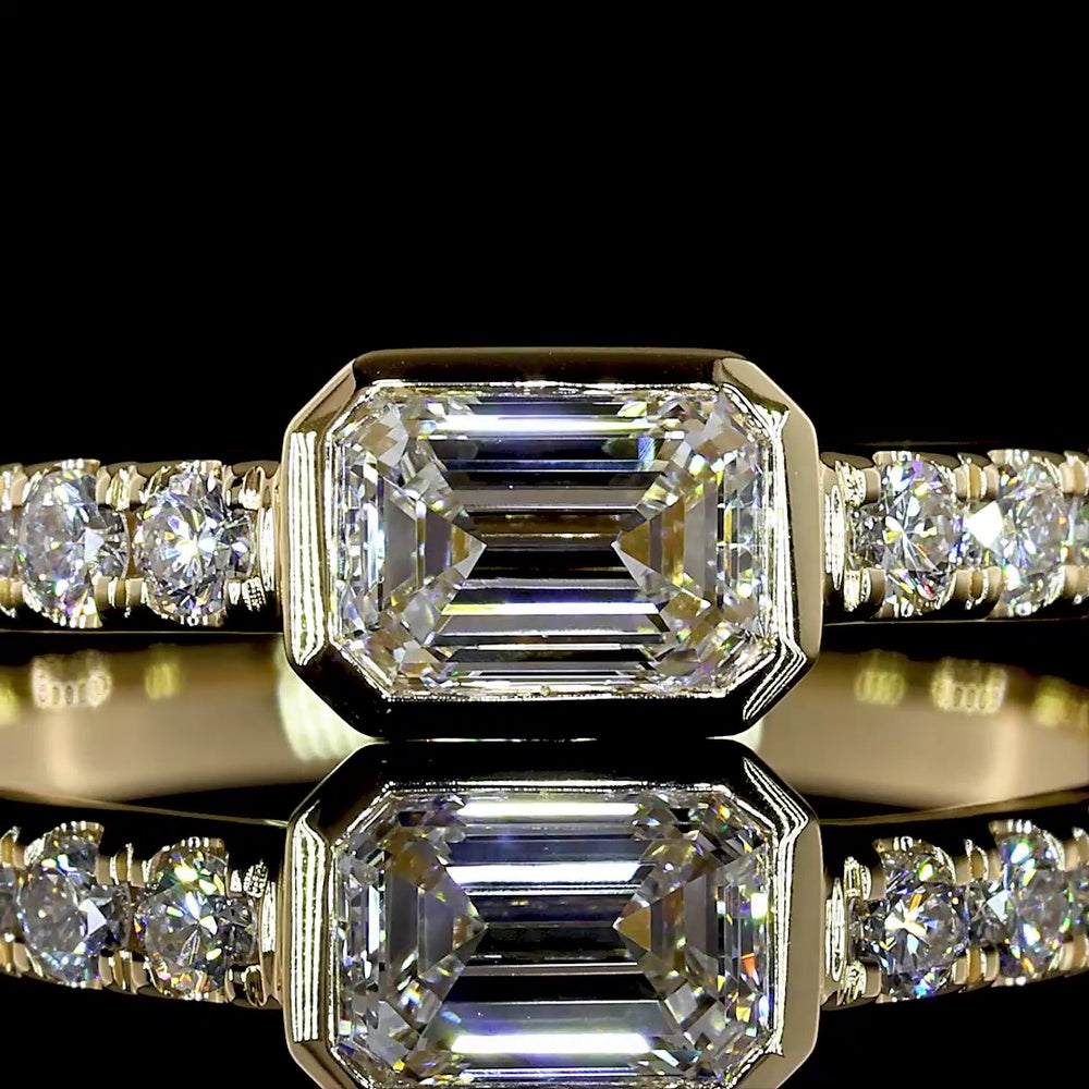 14K Yellow Gold East-West Emerald Cut Lab Diamond Ring with Bezel and Prong Set Accents - 0.76 Carat Total Weight - Covaloro Fine Jewelry