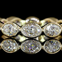14K Yellow Gold East-West Eternity Band with Bezel Set Oval Cut Lab Diamonds - 1.76 Carat Total Weight - Covaloro Fine Jewelry
