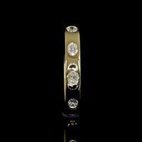 14K Yellow Gold East-West Eternity Band with Flush Set Oval Cut Lab Diamonds - 0.56 Carat Total Diamond Weight - Covaloro Fine Jewelry