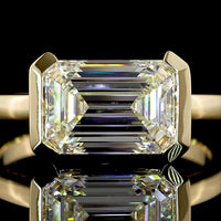 14K Yellow Gold East-West Half Bezel Solitaire Ring with 3.01 Carat Emerald Cut Lab Diamond - E-F Color VS1 Clarity IGI Certified - Covaloro Fine Jewelry