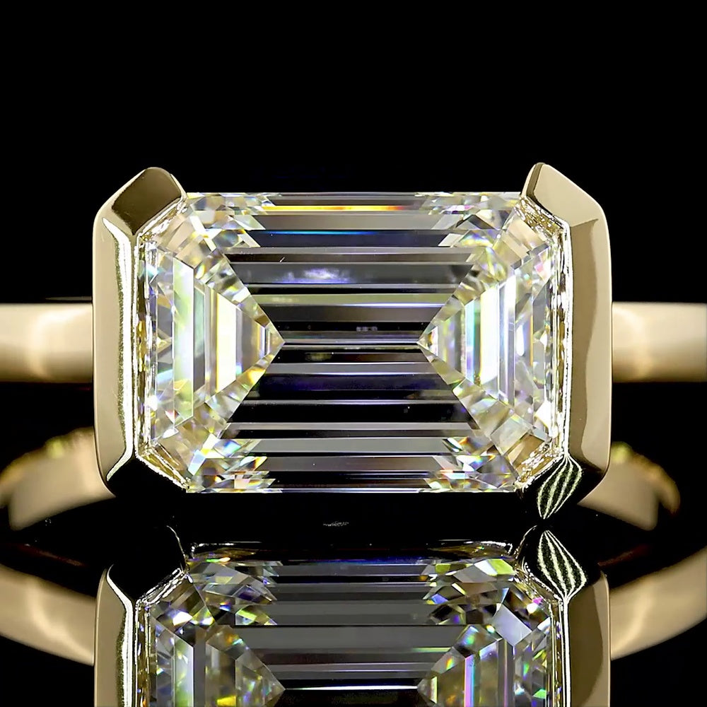 14K Yellow Gold East-West Half Bezel Solitaire Ring with 3.01 Carat Emerald Cut Lab Diamond - E-F Color VS1 Clarity IGI Certified - Covaloro Fine Jewelry