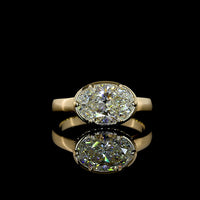 14K Yellow Gold East-West Hidden Halo Ring with 2.13 Carat Oval Cut Lab Diamond and 0.12 Carat Brilliant Cut Accent Diamonds - 2.25 Carat Total Weight - Covaloro Fine Jewelry