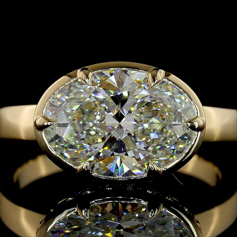 14K Yellow Gold East-West Hidden Halo Ring with 3.06 Carat Oval Lab Diamond and 0.25 Carat Round Lab Diamond Accents - 3.31 Carat Total Weight - Covaloro Fine Jewelry