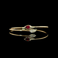 14K Yellow Gold East-West Pear Shape Bezel Set Bangle Bracelet with Lab-Grown Ruby - 0.59 Carat Total Weight - Covaloro Fine Jewelry