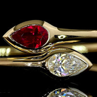 14K Yellow Gold East-West Pear Shape Bezel Set Bangle Bracelet with Lab-Grown Ruby - 0.59 Carat Total Weight - Covaloro Fine Jewelry