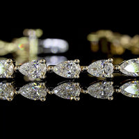14K Yellow Gold East-West Pear Shape Lab Diamond Tennis Bracelet - 4.14 Total Carat Weight, E-F Color VS1 Clarity (37 Stones) - Covaloro Fine Jewelry