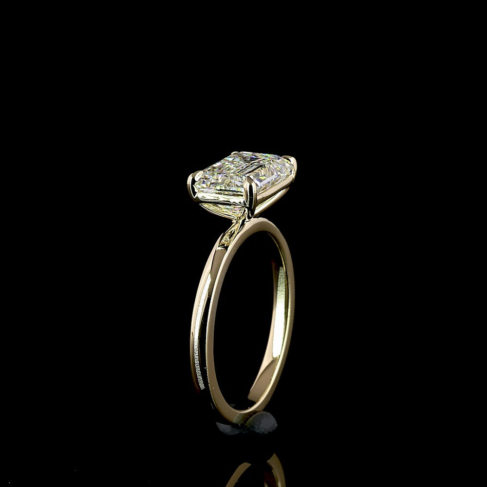 14K Yellow Gold East-West Set Solitaire Ring with 3.04 Carat Emerald Cut Lab Diamond - E Color VVS2 Clarity IGI Certified - Covaloro Fine Jewelry