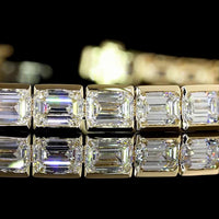 14K Yellow Gold East-West Tennis Bracelet with Half-Bezel Set Emerald Cut Lab Diamonds - 23.14 Carats Total Diamond Weight - Covaloro Fine Jewelry