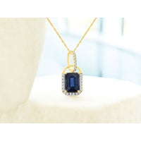 14K Yellow Gold Emerald-Cut Sapphire Pendant with Diamond Halo and Pavé-Accented Bale - 1.05 Carat Sapphire and 0.10 Carat Total Diamond Weight - Royal Jewelry
