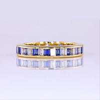14K Yellow Gold Eternity Band with Alternating Baguette Lab Blue Gemstones and Baguette Diamonds - 0.90 Carat Total Weight - Covaloro Fine Jewelry