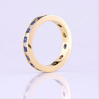 14K Yellow Gold Eternity Band with Alternating Baguette Lab Blue Gemstones and Baguette Diamonds - 0.90 Carat Total Weight - Covaloro Fine Jewelry