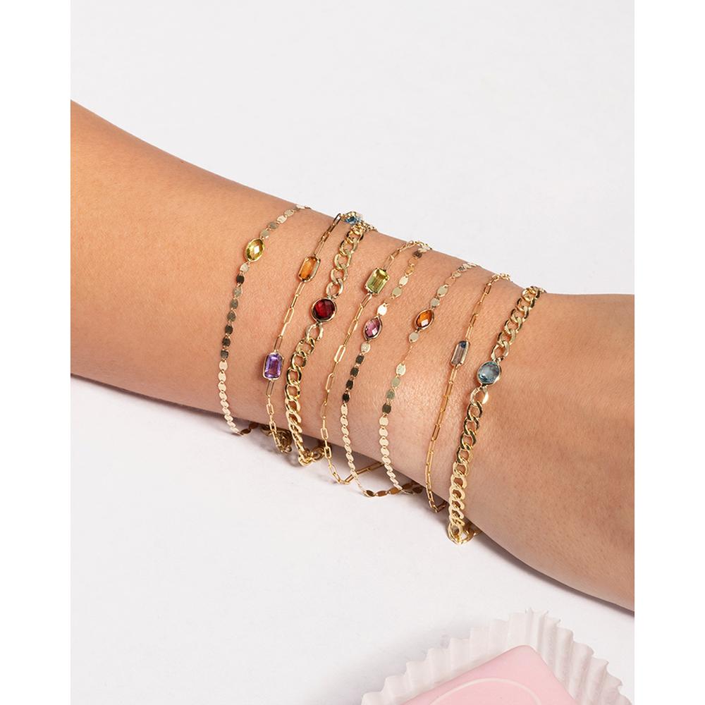 14K Yellow Gold Fancy Link Bracelet with 6x4 Oval Garnet Center - 7.25" by Orozza Fine Jewelry