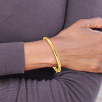14K Yellow Gold Florentine Hinged Baby Bangle with Diamond-Cut Texture by Oro Pregiato