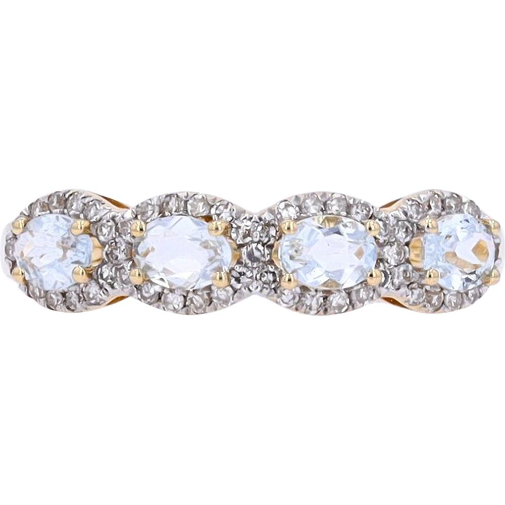 14K Yellow Gold Four-Stone Oval Aquamarine Ring with Diamond Halos - 0.25 Carats Total Diamond Weight